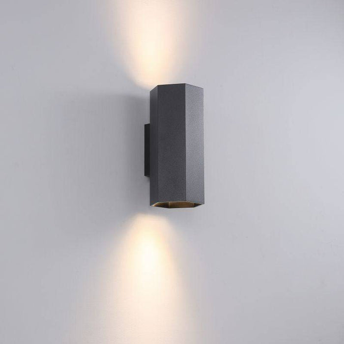 Black up and down wall light on a grey background