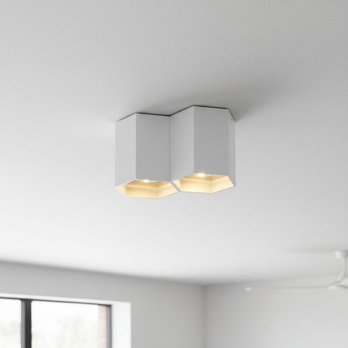 white contemporary ceiling light mounted on a living room ceiling