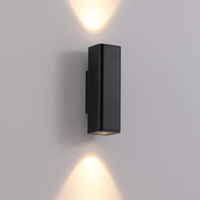 black up and down exterior light shown on a white wall