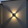 black outside wall light mounted on the outside wall of a house