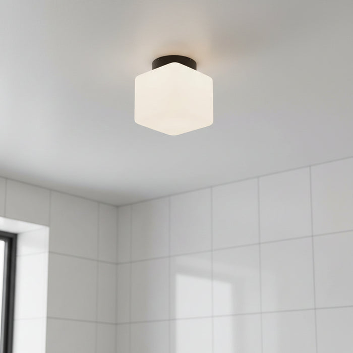 IP65 bathroom ceiling light mounted on a grey ceiling in a bathroom