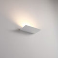 White indoor uplight wall light mounted on a white wall
