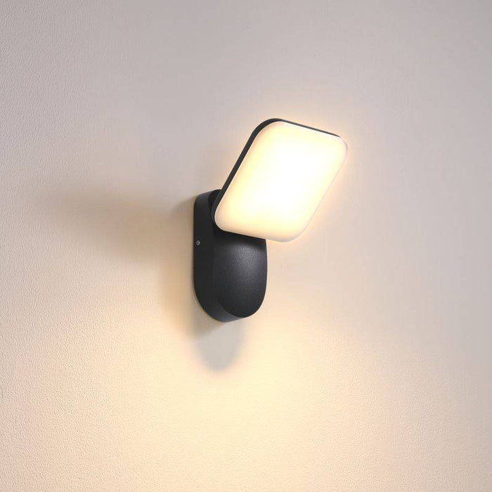 black external wall light shown on a white wall