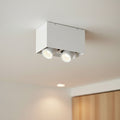 white adjustable LED ceiling light fixture on a white ceiling in a home