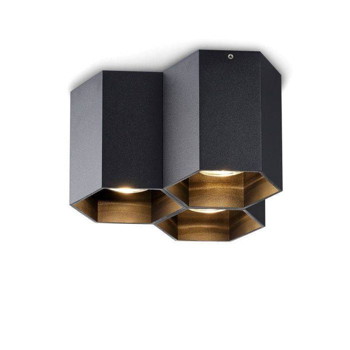 black surface mounted ceiling spotlights on white background