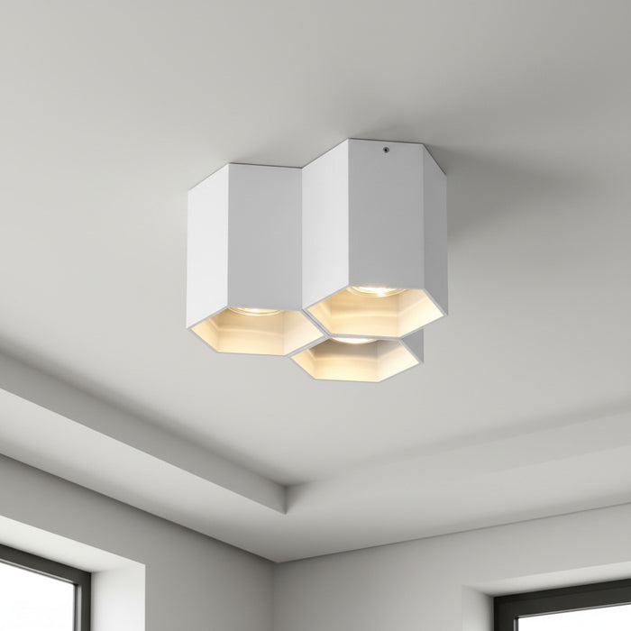white modern flush ceiling light mounted in a modern home