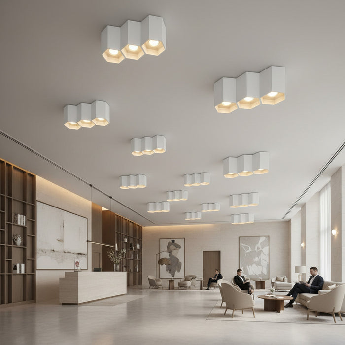 white flush mount ceiling light fixture in a hotel reception area