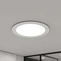 white slim downlight installed into a hotel ceiling