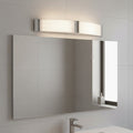 bathroom shaver light mounted above a mirror in a contemporary bathroom