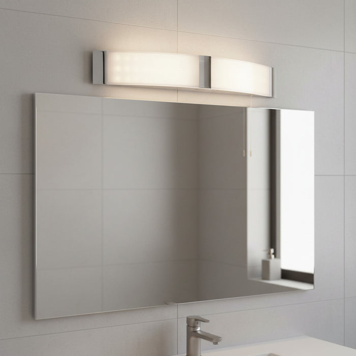 bathroom shaver light mounted above a mirror in a contemporary bathroom