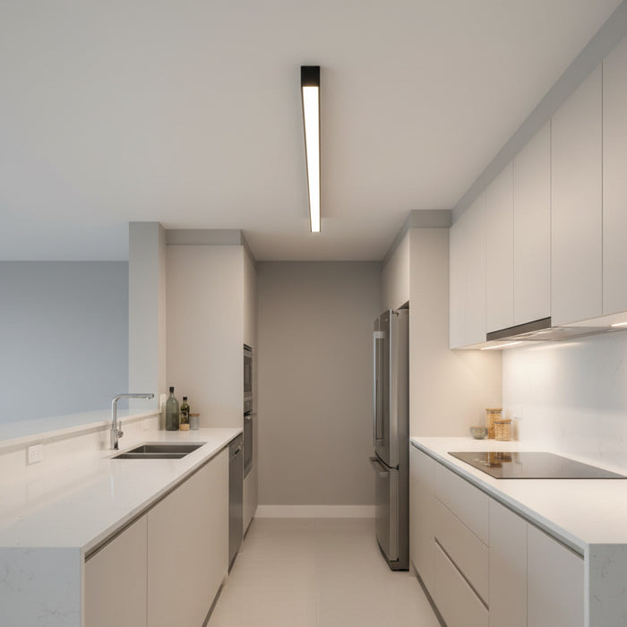 black surface mounted linear light shown in a galley kitchen