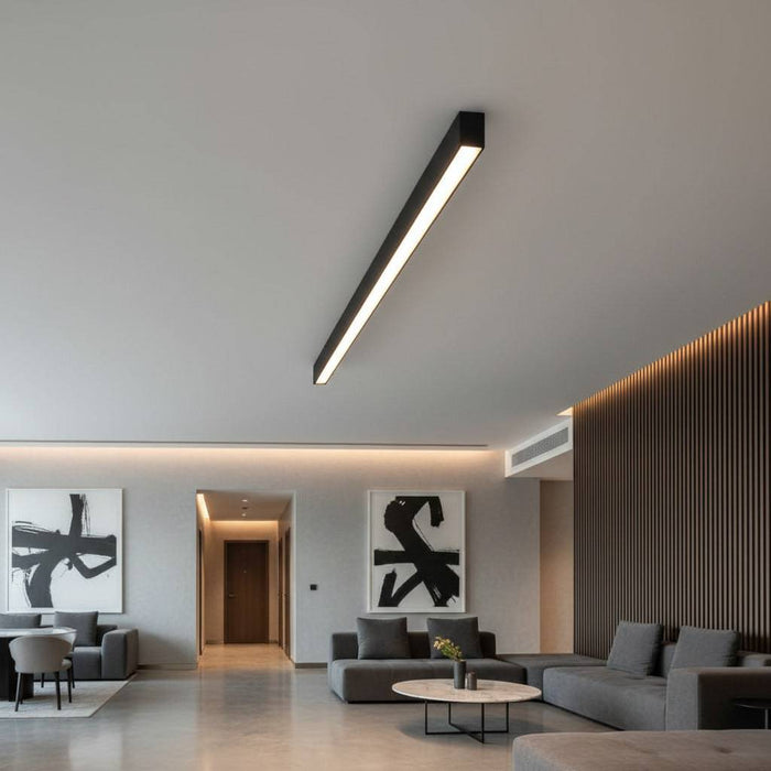 black surface mounted linear light fitted in a modern hotel reception