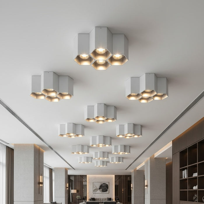 Silver modern flush mount ceiling light in a hotel bar