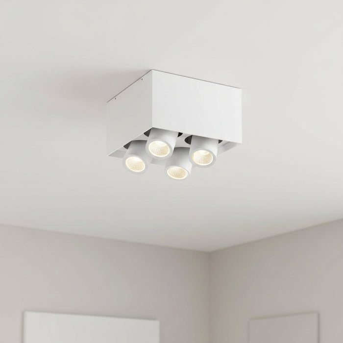 white surface mounted ceiling adjuistable spotlight mounted on the ceiling in a modern home