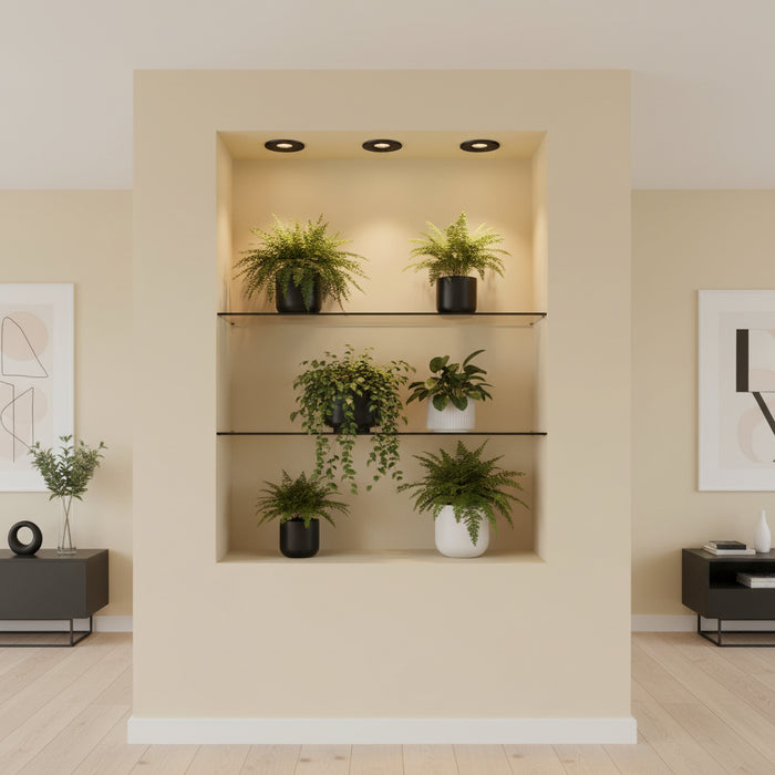 Mini recessed spot lamp above plants and shelves on a pale yellow background