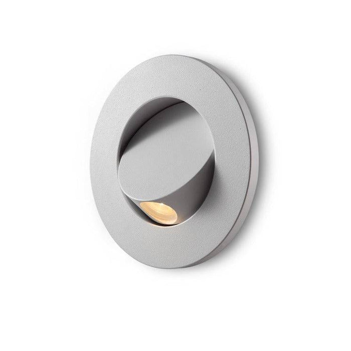 white recessed bedside reading light on a white background