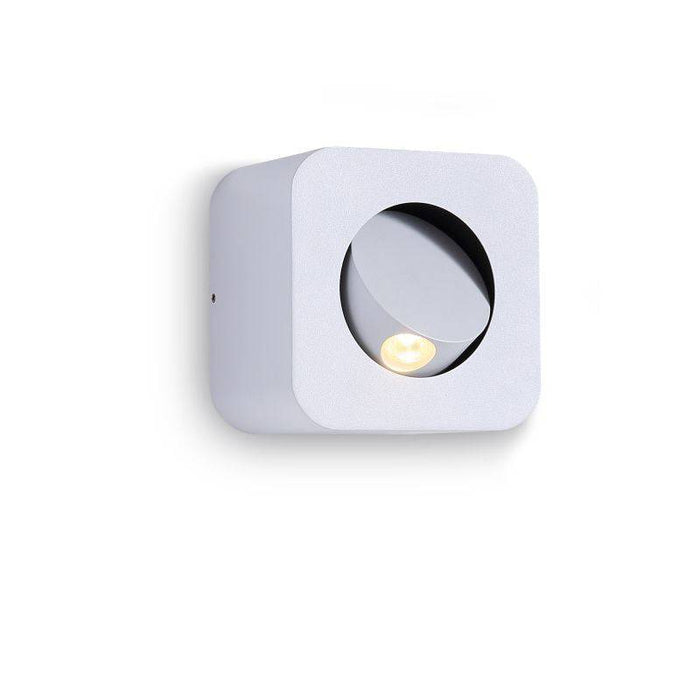 white wall mounted bedside lamp installed on a white wall