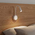 white dimmable bedroom reading lamp fitted to a wooden bed headboard