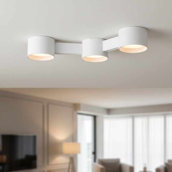 white ceiling downlighter mounted in a modern home
