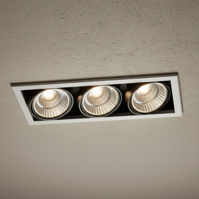 commercial recessed ceiling spotlights installed on a textured hotel ceiling