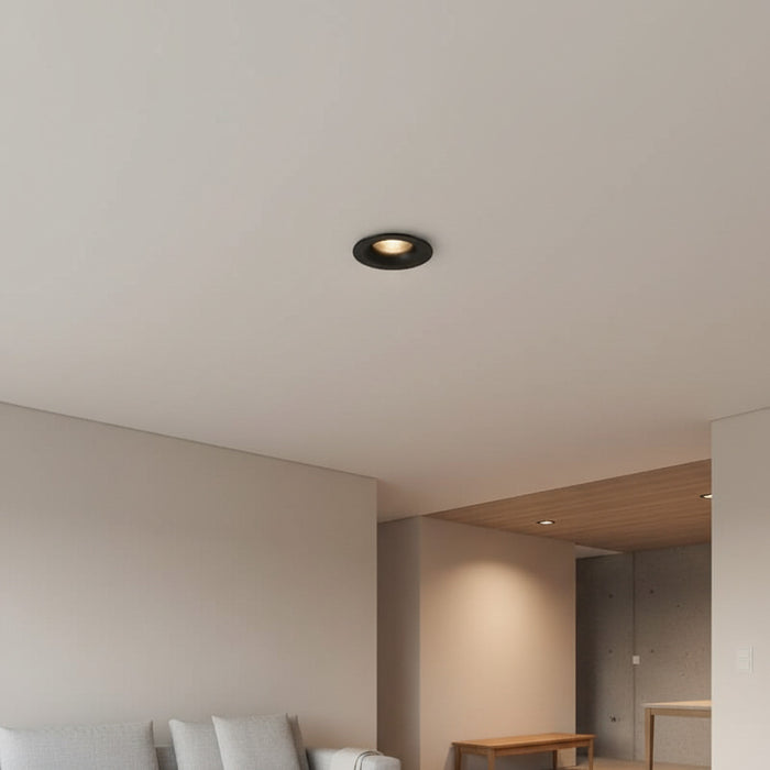 black LED ceiling recessed downlight installed in the ceiling in a modern house