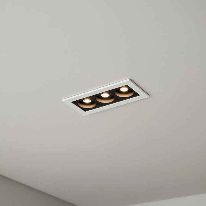 anti glare recessed downlighter installed on a light grey ceiling