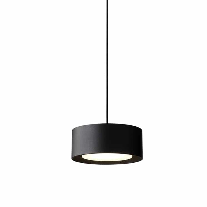 Black circular pendant light on a white background