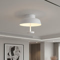 white flush mount ceiling light mounted in a modern home