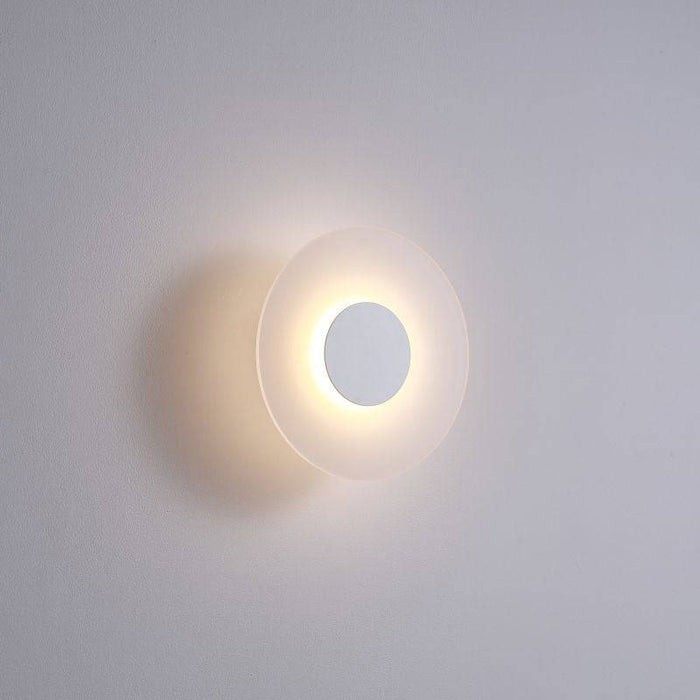 White modern outdoor wall light mounted on a white wall