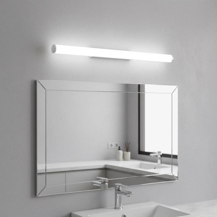 white bathroom vanity mirror light mounted over a mirror in a modern neutral bathroom