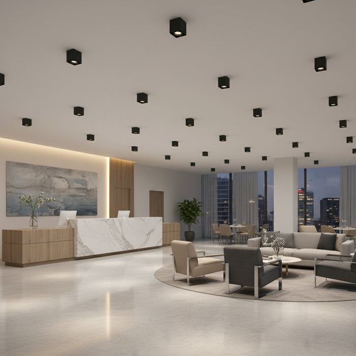 black square surface mount downlight fitted in a hotel reception area
