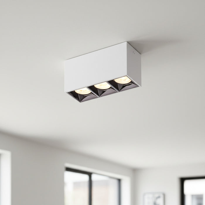 white semi flush mount ceiling lamp on a white ceiling in a modern kitchen
