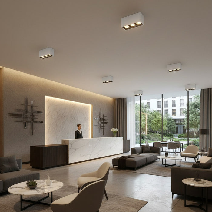 white semi flush mount ceiling lamp in a modenr hotel reception area