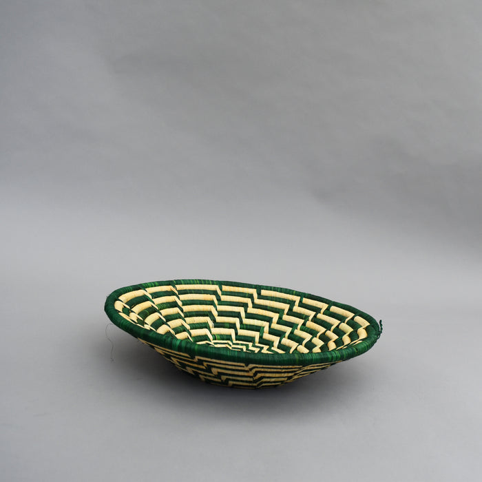 Hand woven straw. A tradition and art which has been part of Ugandan culture for centuries.  With all of the materials used being natural products or recycled, we also believe this is a lovely way of making use of natural resources the world has to offer and making positive changes to become more sustainable.  Beautifully, unique, handmade basket made out of banana stalks and raffia fibres also known as the Ugandan basket.