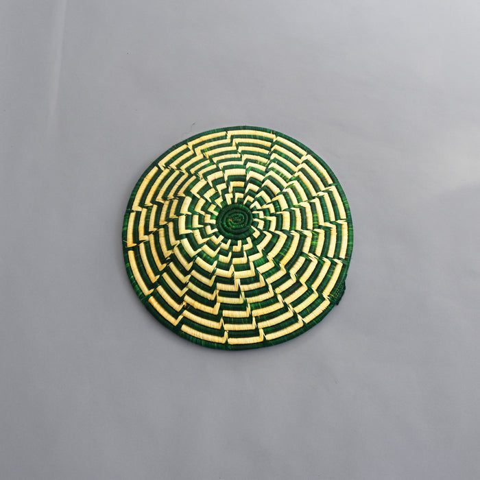 Hand woven straw. A tradition and art which has been part of Ugandan culture for centuries.  With all of the materials used being natural products or recycled, we also believe this is a lovely way of making use of natural resources the world has to offer and making positive changes to become more sustainable.  Beautifully, unique, handmade basket made out of banana stalks and raffia fibres also known as the Ugandan basket.
