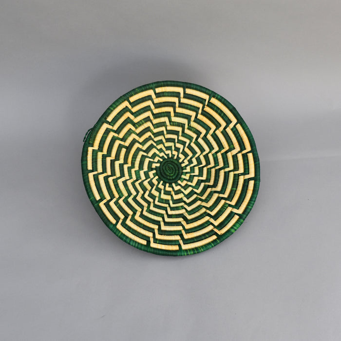 Hand woven straw. A tradition and art which has been part of Ugandan culture for centuries.  With all of the materials used being natural products or recycled, we also believe this is a lovely way of making use of natural resources the world has to offer and making positive changes to become more sustainable.  Beautifully, unique, handmade basket made out of banana stalks and raffia fibres also known as the Ugandan basket.