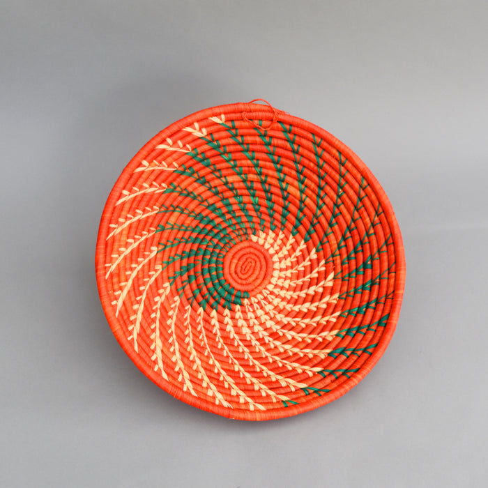 Hand woven straw. A tradition and art which has been part of Ugandan culture for centuries.  With all of the materials used being natural products or recycled, we also believe this is a lovely way of making use of natural resources the world has to offer and making positive changes to become more sustainable.  Beautifully, unique, handmade basket made out of banana stalks and raffia fibres also known as the Ugandan basket.