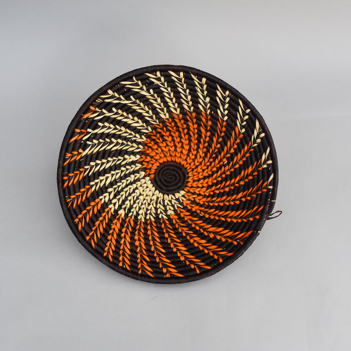 Hand woven straw. A tradition and art which has been part of Ugandan culture for centuries.  With all of the materials used being natural products or recycled, we also believe this is a lovely way of making use of natural resources the world has to offer and making positive changes to become more sustainable.  Beautifully, unique, handmade basket made out of banana stalks and raffia fibres also known as the Ugandan basket.