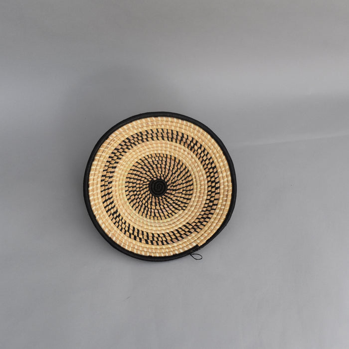 Hand woven straw. A tradition and art which has been part of Ugandan culture for centuries.  With all of the materials used being natural products or recycled, we also believe this is a lovely way of making use of natural resources the world has to offer and making positive changes to become more sustainable.  Beautifully, unique, handmade basket made out of banana stalks and raffia fibres also known as the Ugandan basket.