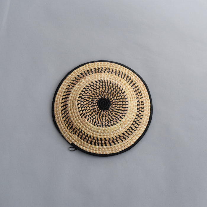 Hand woven straw. A tradition and art which has been part of Ugandan culture for centuries.  With all of the materials used being natural products or recycled, we also believe this is a lovely way of making use of natural resources the world has to offer and making positive changes to become more sustainable.  Beautifully, unique, handmade basket made out of banana stalks and raffia fibres also known as the Ugandan basket.