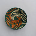 Hand woven straw. A tradition and art which has been part of Ugandan culture for centuries.  With all of the materials used being natural products or recycled, we also believe this is a lovely way of making use of natural resources the world has to offer and making positive changes to become more sustainable.  Beautifully, unique, handmade basket made out of banana stalks and raffia fibres also known as the Ugandan basket.
