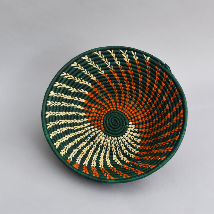 Hand woven straw. A tradition and art which has been part of Ugandan culture for centuries.  With all of the materials used being natural products or recycled, we also believe this is a lovely way of making use of natural resources the world has to offer and making positive changes to become more sustainable.  Beautifully, unique, handmade basket made out of banana stalks and raffia fibres also known as the Ugandan basket.