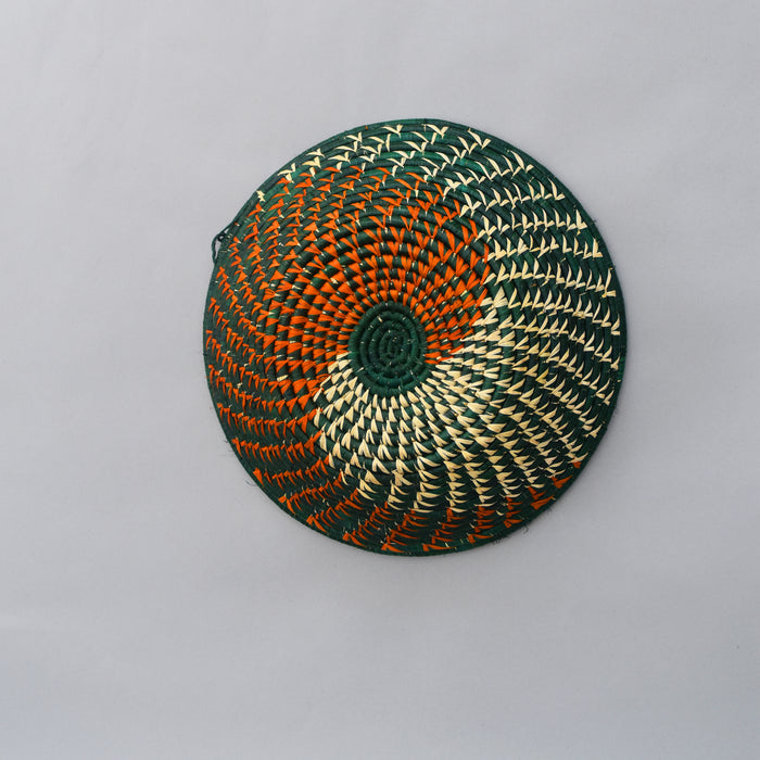 Hand woven straw. A tradition and art which has been part of Ugandan culture for centuries.  With all of the materials used being natural products or recycled, we also believe this is a lovely way of making use of natural resources the world has to offer and making positive changes to become more sustainable.  Beautifully, unique, handmade basket made out of banana stalks and raffia fibres also known as the Ugandan basket.
