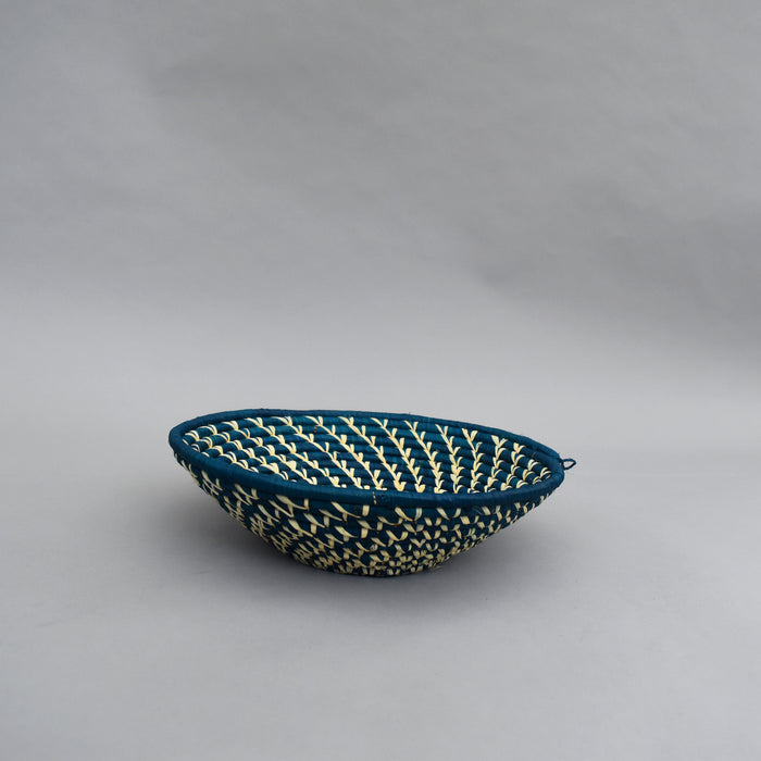 Hand woven straw. A tradition and art which has been part of Ugandan culture for centuries.  With all of the materials used being natural products or recycled, we also believe this is a lovely way of making use of natural resources the world has to offer and making positive changes to become more sustainable.  Beautifully, unique, handmade basket made out of banana stalks and raffia fibres also known as the Ugandan basket.