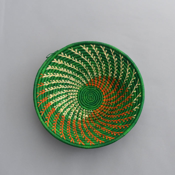 Hand woven straw. A tradition and art which has been part of Ugandan culture for centuries.  With all of the materials used being natural products or recycled, we also believe this is a lovely way of making use of natural resources the world has to offer and making positive changes to become more sustainable.  Beautifully, unique, handmade basket made out of banana stalks and raffia fibres also known as the Ugandan basket.