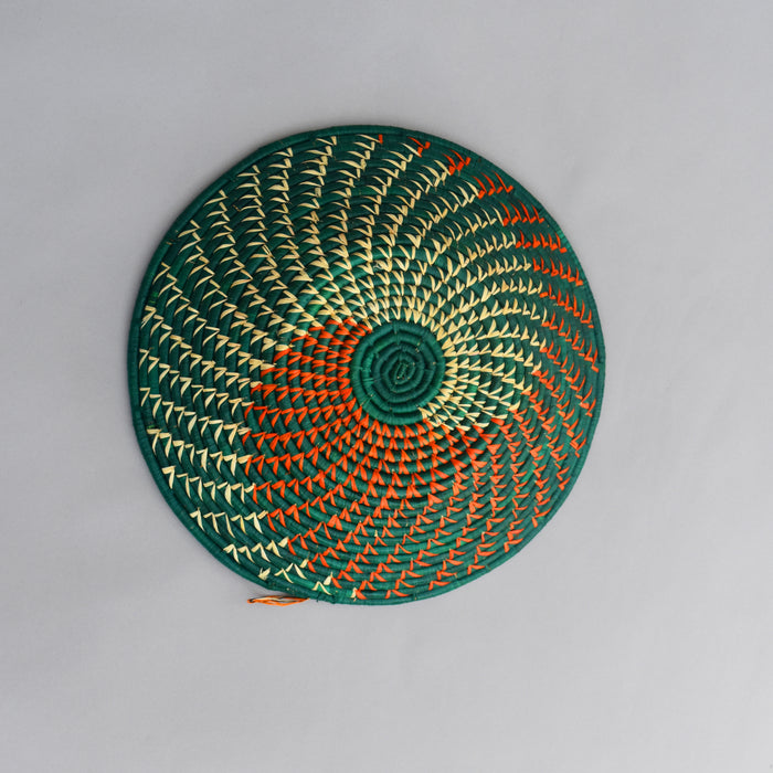 Hand woven straw. A tradition and art which has been part of Ugandan culture for centuries.  With all of the materials used being natural products or recycled, we also believe this is a lovely way of making use of natural resources the world has to offer and making positive changes to become more sustainable.  Beautifully, unique, handmade basket made out of banana stalks and raffia fibres also known as the Ugandan basket.