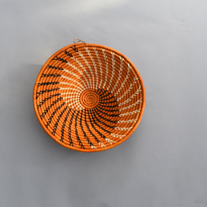 Hand woven straw. A tradition and art which has been part of Ugandan culture for centuries.  With all of the materials used being natural products or recycled, we also believe this is a lovely way of making use of natural resources the world has to offer and making positive changes to become more sustainable.  Beautifully, unique, handmade basket made out of banana stalks and raffia fibres also known as the Ugandan basket.
