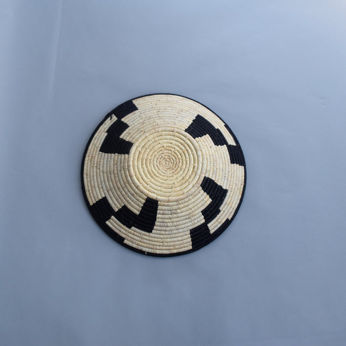 Hand woven straw. A tradition and art which has been part of Ugandan culture for centuries.  With all of the materials used being natural products or recycled, we also believe this is a lovely way of making use of natural resources the world has to offer and making positive changes to become more sustainable.  Beautifully, unique, handmade basket made out of banana stalks and raffia fibres also known as the Ugandan basket.