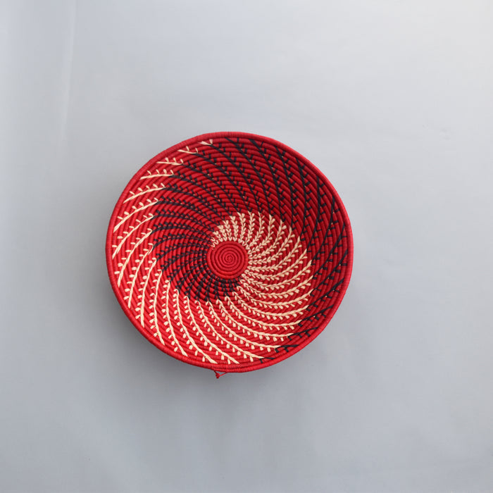 Hand woven straw. A tradition and art which has been part of Ugandan culture for centuries.  With all of the materials used being natural products or recycled, we also believe this is a lovely way of making use of natural resources the world has to offer and making positive changes to become more sustainable.  Beautifully, unique, handmade basket made out of banana stalks and raffia fibres also known as the Ugandan basket.