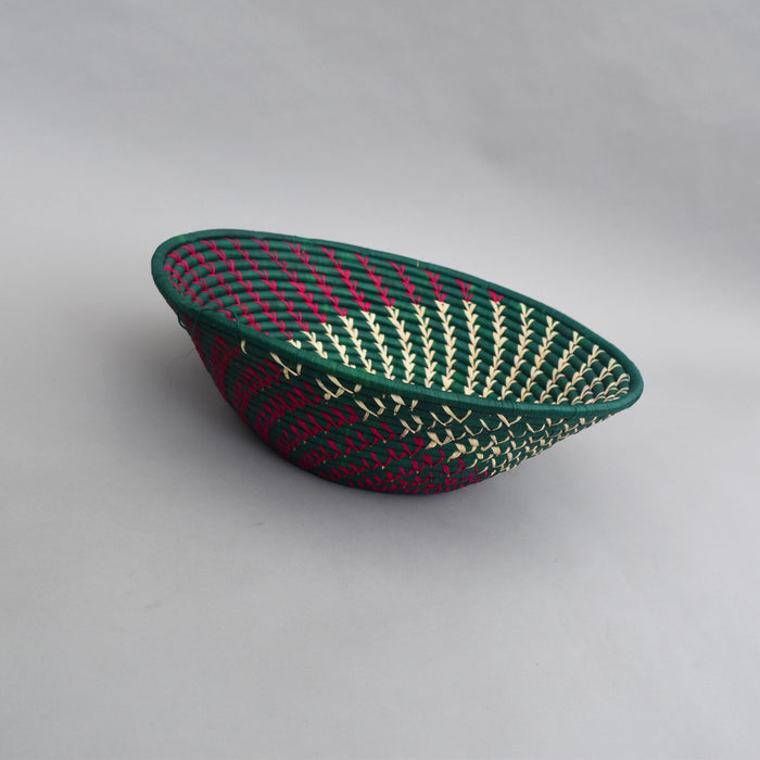 Hand woven straw. A tradition and art which has been part of Ugandan culture for centuries.  With all of the materials used being natural products or recycled, we also believe this is a lovely way of making use of natural resources the world has to offer and making positive changes to become more sustainable.  Beautifully, unique, handmade basket made out of banana stalks and raffia fibres also known as the Ugandan basket.